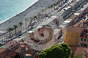 Aerial image of rooftops, and blue mediterranean sea. `promenade des anglais`. Â«Â NiceÂ Â», France.